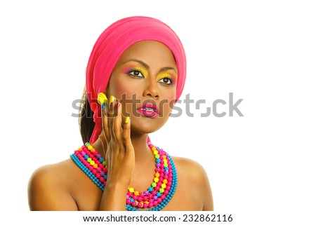 Colorful manicure and make up. Beauty woman portrait, Black African model with headscarf and accessories. Isolated, over white background, with copy space.  