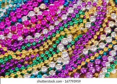 Colorful Mardi Gras Beads Background