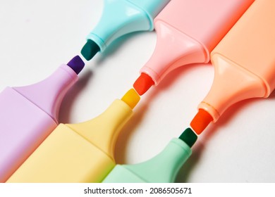 Colorful marker pen on white background. Multi-colored highlighter, close-up