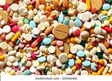 A lot of colorful medication and pills from above - Shutterstock ID 324566462