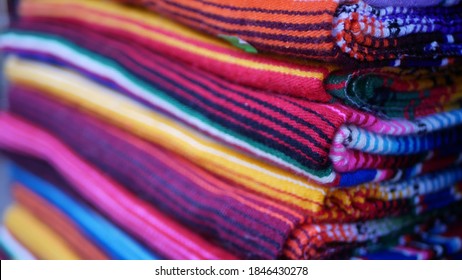 Colorful Mexican Wool Serape Blankets Texture. Woven Ornamental Vivid Textile With Authentic Latin American Pattern. Striped Multi Colored Fabric For Poncho And Sombrero. Hispanic Indigenous Style.