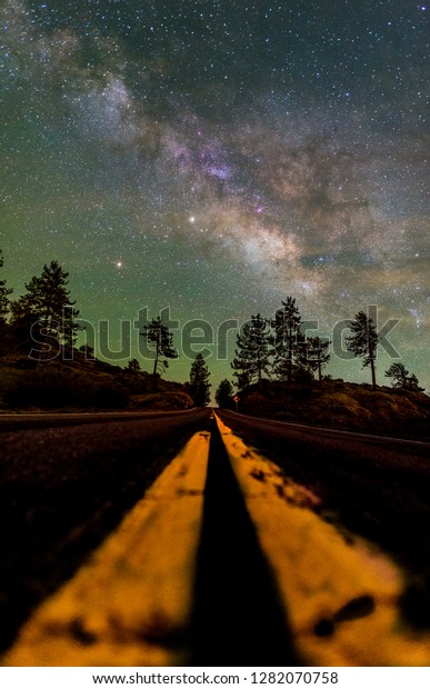 Colorful\
Milky Way Galaxy with Green Airglow Over\
Desert