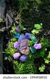 Colorful Mineral Gemstones On Natural Forest Background. Magic Quartz Stones For Crystal Ritual, Esoteric Spiritual Practice. Wicca Altar. Top View