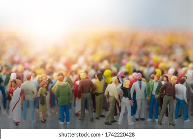 Colorful miniature crowd in the Sun. Multiracial gathering of people.