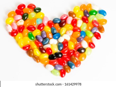 Colorful, mixed jelly beans in heart shape on white background - Powered by Shutterstock