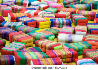 Colorful Monk's Prayer Or Meditation Cushions Scattered In The Courtyard Of Wat Pho Temple In Bangkok