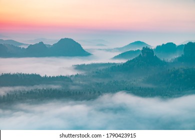 Colorful morning with  Kleiner Winterberg silhouettes, Saxon Switzerland, Germany. Misty, rocky. - Shutterstock ID 1790423915