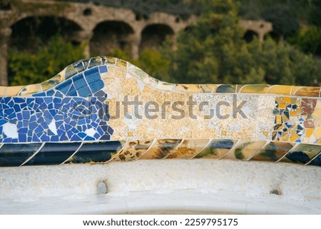 Colorful mosaic tiles in Park Guell Barcelona, Spain