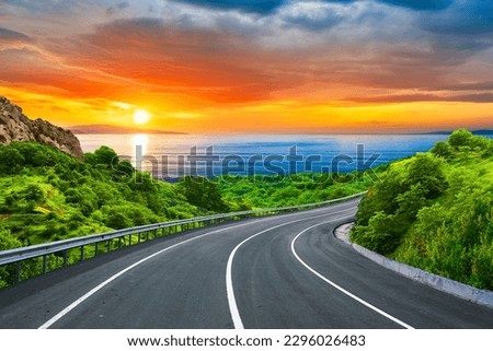 colorful nature scenery on beautiful road on the beach in summer. Stunning sea view on holiday road landscape in green mountains. highway landscape at sunset. coastal road in europe and mediterranean.