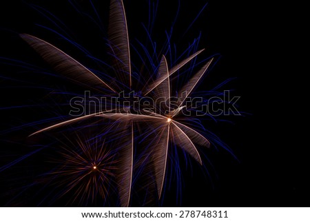 Colorful nd festive fireworks display against dark sky during new year celebrations Imagine de stoc © 