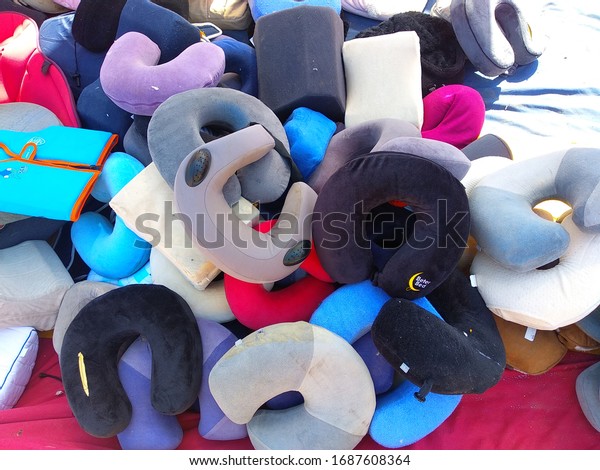 Colorful neck pillows at a stall - Karachi Pakistan\
- mar 2020