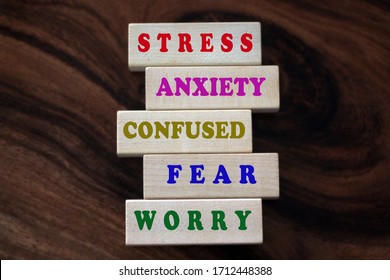 Colorful negative single word list on wooden blocks. Master your mind concept from stress, anxiety, confused, fear, worry and negativity.