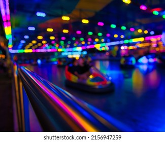 The Colorful Neon Lights At A Bumper Car Park