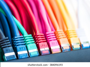 Colorful network cables connected to a switch