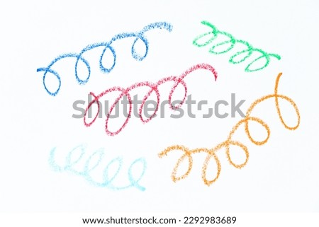 Colorful oil pastel hand drawing in curve or wavy line shape on white paper background