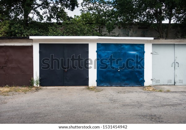 colorful old garage doors.\
rusty gates