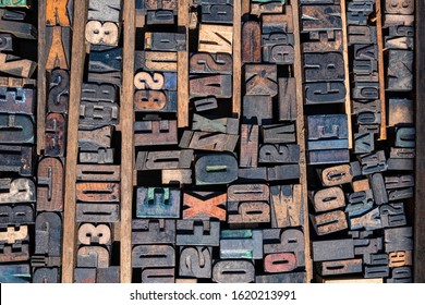 colorful old letterpress letters in a holding tray - Powered by Shutterstock