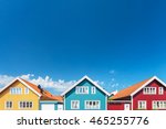 Colorful old swedish houses in front of a blue sky