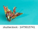 Colorful oragami crane with plain background