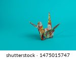 Colorful oragami crane with plain background