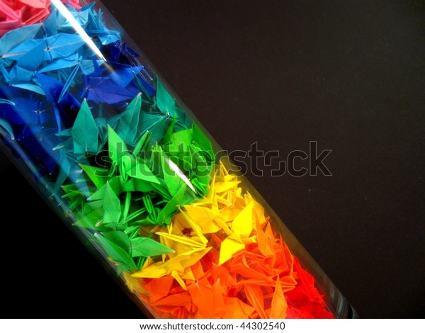Colorful Origami Paper Cranes Transparent Glass Stock Image