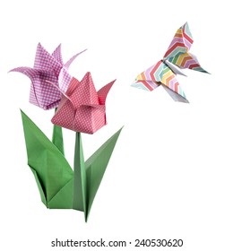 Colorful origami tulips and rainbow butterfly paper craft isolated on white background 