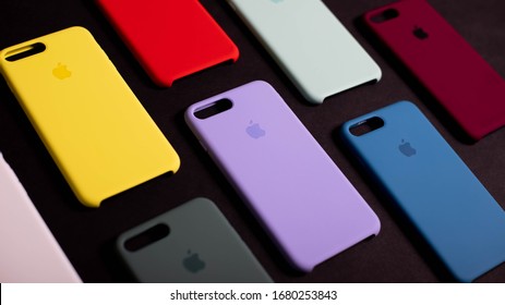 Colorful original cases for iPhone 7 Plus, iPhone 8 Plus on black background. Apple accessories. Colorful Phone Cases For Sale In Mobile Phones Stores. Kiev, Ukraine 03.03.2020