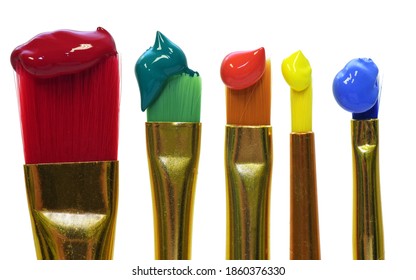 Colorful paintbrushes are placed vertically next to each other and each has color at the tip, against a white background