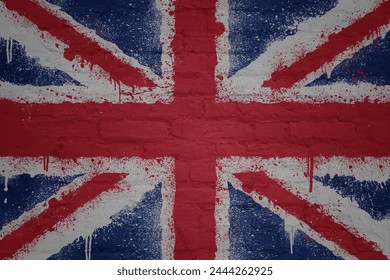 colorful painted big national flag of great britain on a massive old brick wall - Powered by Shutterstock