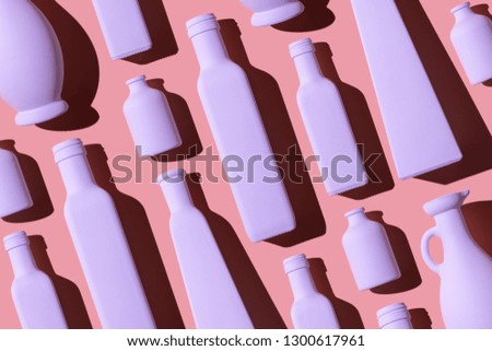 Similar – Image, Stock Photo Bottles with coral colored fluids in different shades