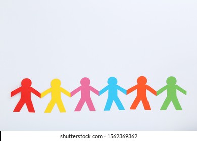 Colorful Paper Chain People On White Background