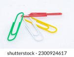Colorful paper clip with clean white background. Photo taken with Tamron