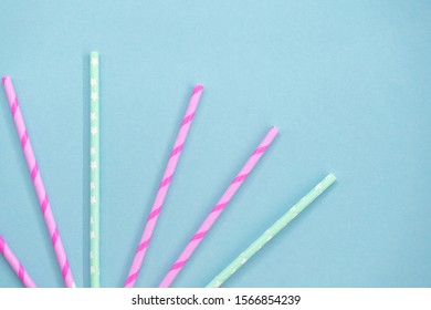 Colorful Paper coctail tubes on the blue background. Eco friendly. Zero Waste - Shutterstock ID 1566854239