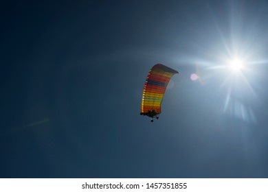 colorful paragliding on the blue sky in sunnyday 