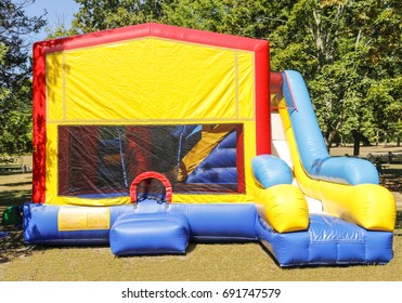 Colorful party Air slide in park on sunny day - Shutterstock ID 691747579