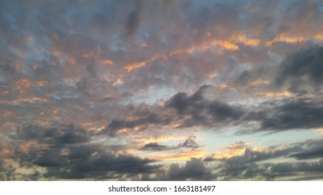 Colorful Pastel Clouds During Sunset In The Evening. Sky Only. Light Shiny Evening. Copy Space