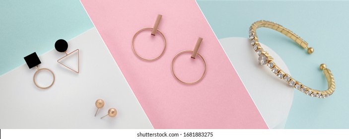 Colorful pastel colors collage of modern golden jewelries bracelet and earrings  - Shutterstock ID 1681883275