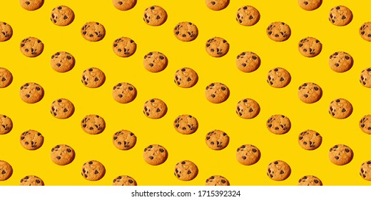 Colorful Pattern Of Sweet Cookies On Yellow Background. Top View. Flay Lay