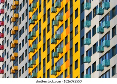 Colorful pattern from windows and balconies in modern residential building