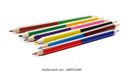 Colorful pencils set arrangement, row isolated on white background, side view