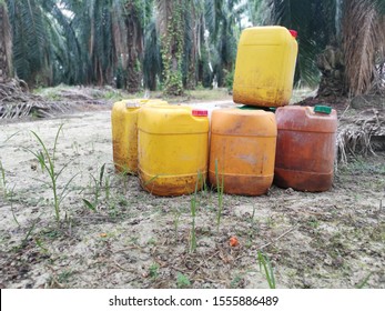 Colorful Pesticide Containers Left At The Oil Palm Estate. 