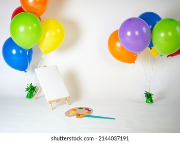 Colorful Photography Set With Balloons And Painter's Canvas