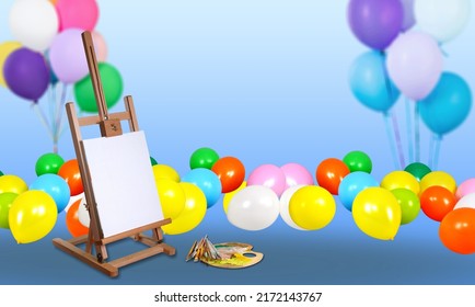 Colorful Photography Set With Balloons And Painter's Canvas On The Desk