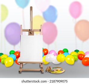 Colorful Photography Set With Balloons And Painter's Canvas On The Desk