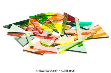 Colorful Pile Of Broken Stained Glass Shards On A White Background.