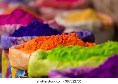 Colorful Piles Of Powdered Dyes Used For Holi Festival In India
