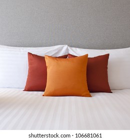 Colorful Pillow On Hotel Bed With Space For Text