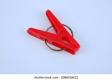 Colorful plastic clothespin white isolated background.