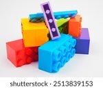 Colorful Plastic toy blocks isolated on white background.