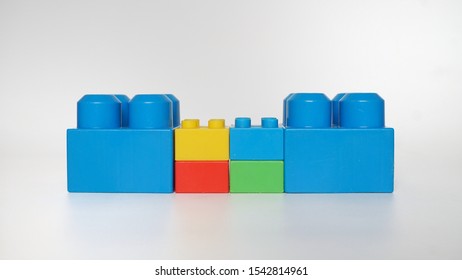 Colorful Plastic Toy Blocks Isolated On White Background.Kids Education Concept. 